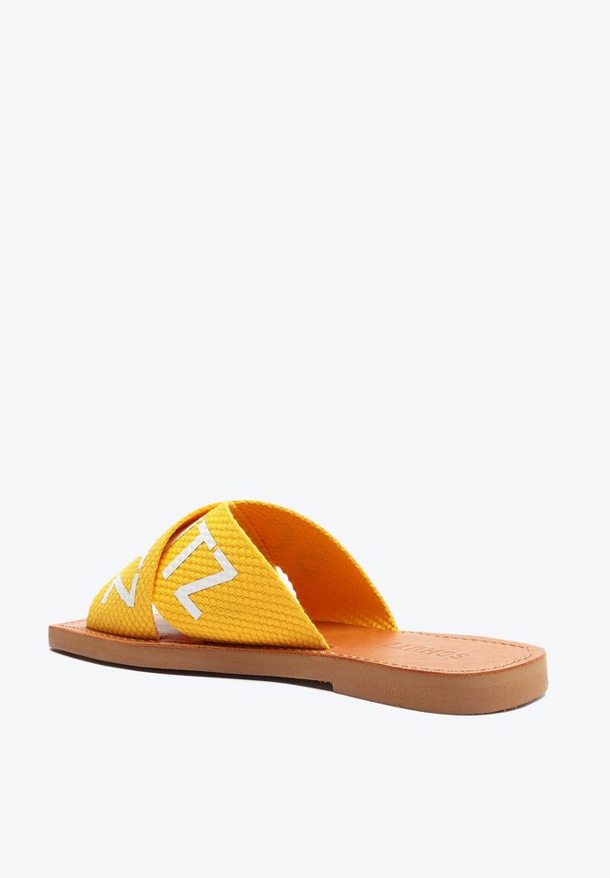 Sandália Rasteira de X Schutz Logo Amarelo Sandália Rasteira de X Schutz Logo Amarelo