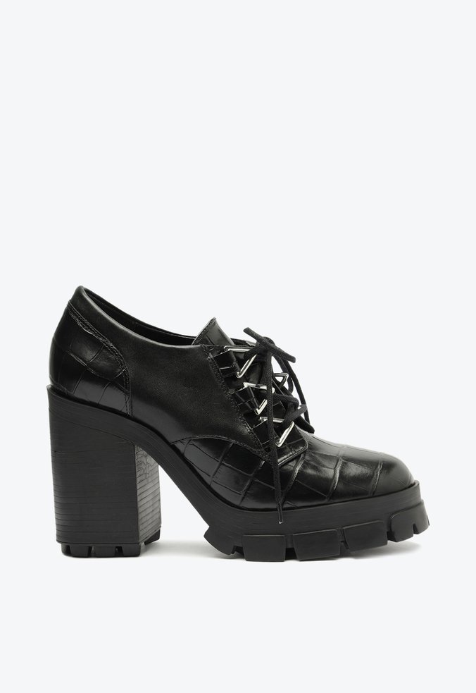 Bota salto hot sale alto tratorado