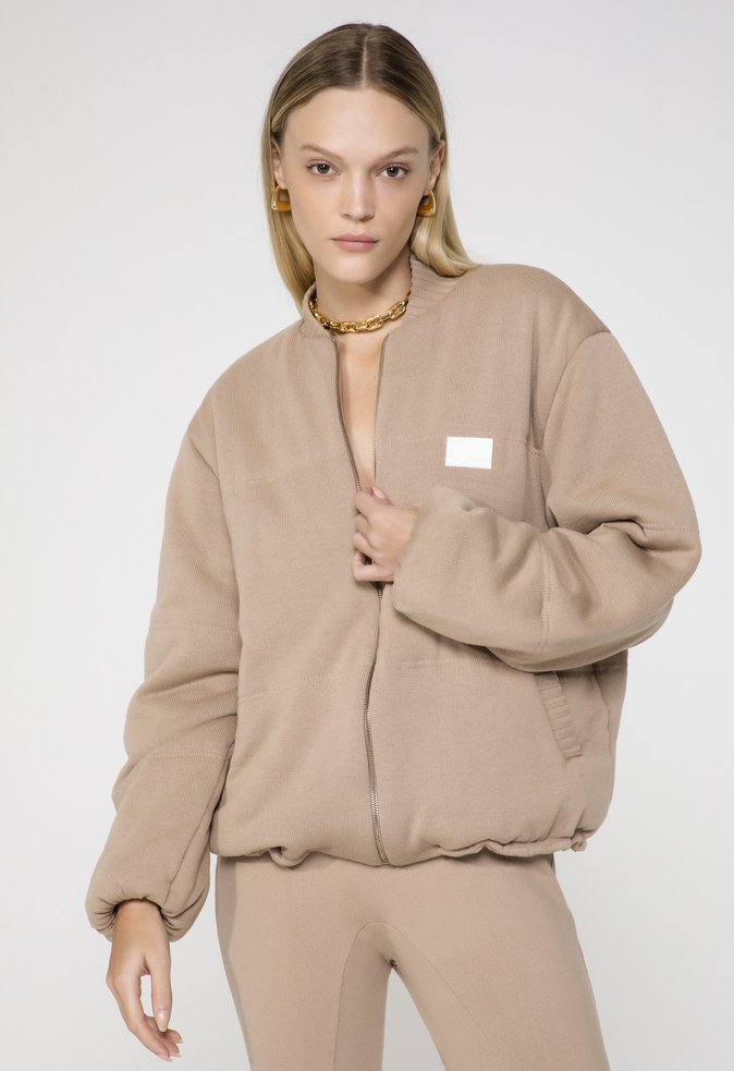 Jaqueta Puffer Tricô Kira Bege